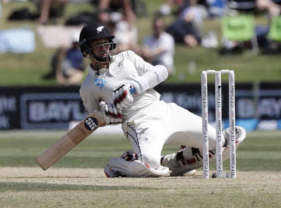 New Zealand's BJ Watling avoids a bouncer during play on day three of the first cricket test between England and New Zealand at Bay Oval in Mount Maunganui, New Zealand, Saturday, Nov. 23, 2019. (AP Photo/Mark Baker)