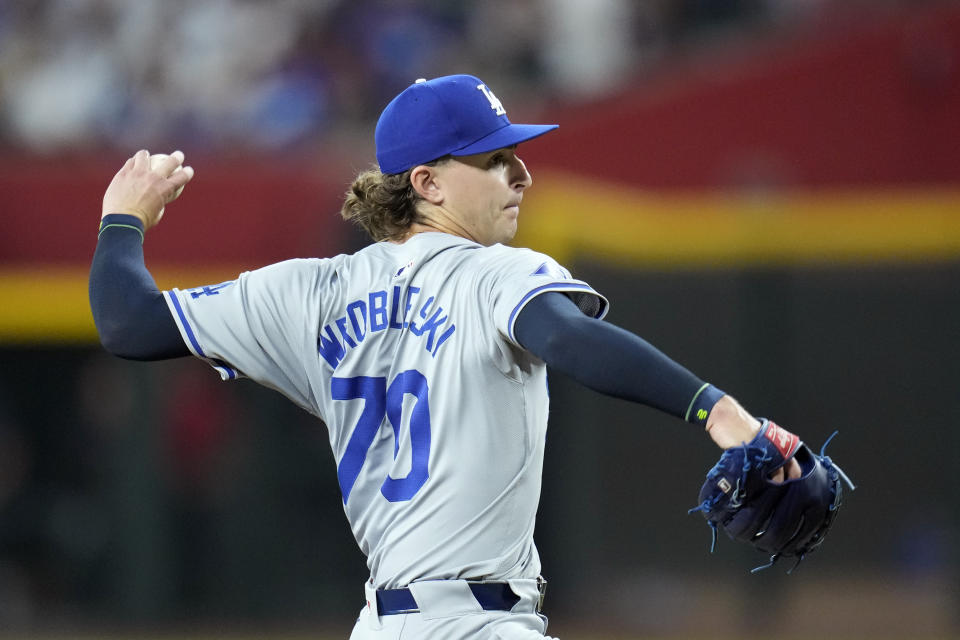 Los Angeles Dodgers starting pitcher Justin Wrobleski throws against the Arizona Diamondbacks during the first inning of a baseball game Sunday, Sept. 1, 2024, in Phoenix. (AP Photo/Ross D. Franklin)