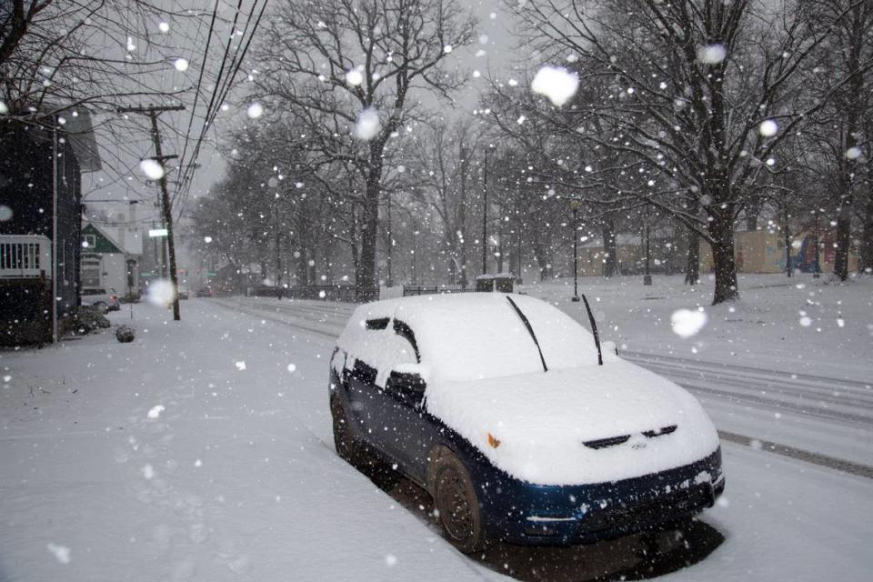 Snow accumulates during the afternoon Thursday, Jan. 6 on a vehicle parked near Lexington’s Duncan Park.