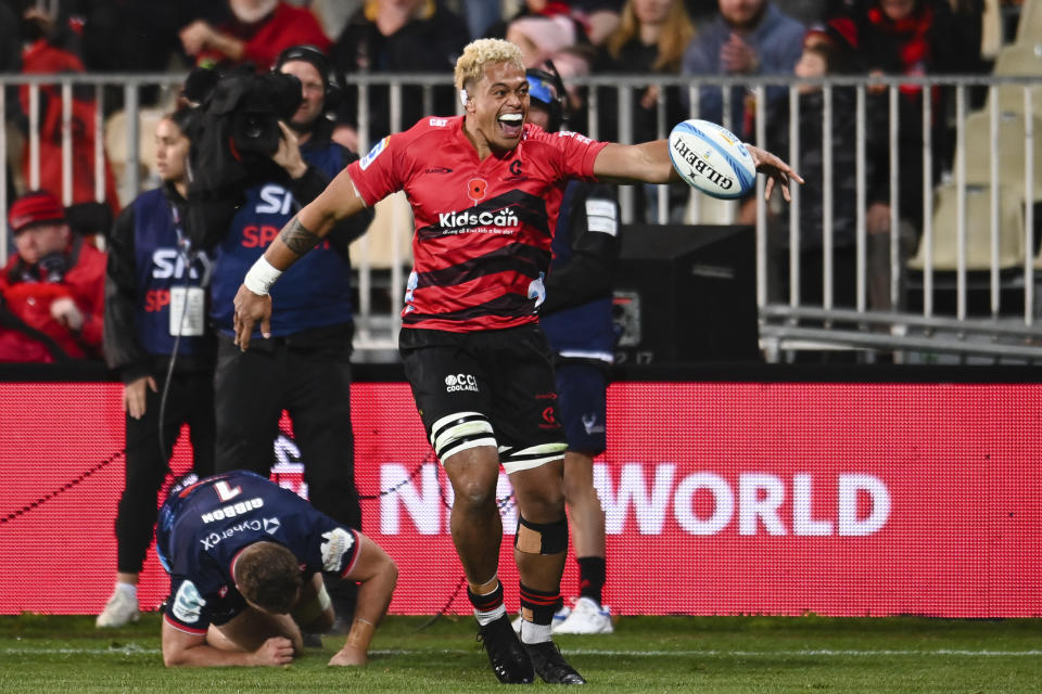 Christian Lio-Willie of the Crusaders celebrates his try during the Super Rugby against the Melbourne Rebels in Christchurch, New Zealand, Friday, April 26, 2024. (John Davidson/Photosport/AAP Image via AP)