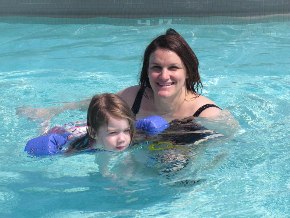 Zara Simon, 3, of Philadelphia, swims with her mother, Amanda on Monday, April 8, 2013, in an outdoor swimming pool at Revel, the Atlantic City N.J. casino resort that heated its water to 87 degrees, part of its plan to attract guests year-round. Atlantic City tourism officials unveiled a new $20 million ad campaign on Tuesday, April 9, 2013 to attract more visitors to the seaside gambling resort. (AP Photo/Wayne Parry)