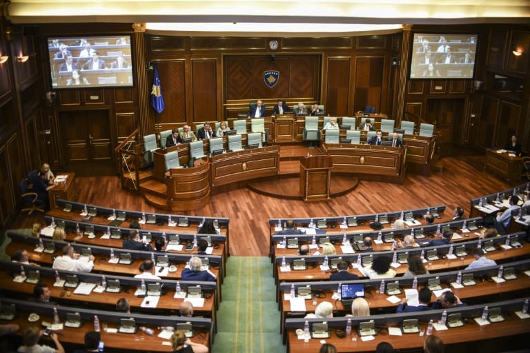 Kosovo lawmakers attend a parliamentary session in Pristina on August 3, 2015