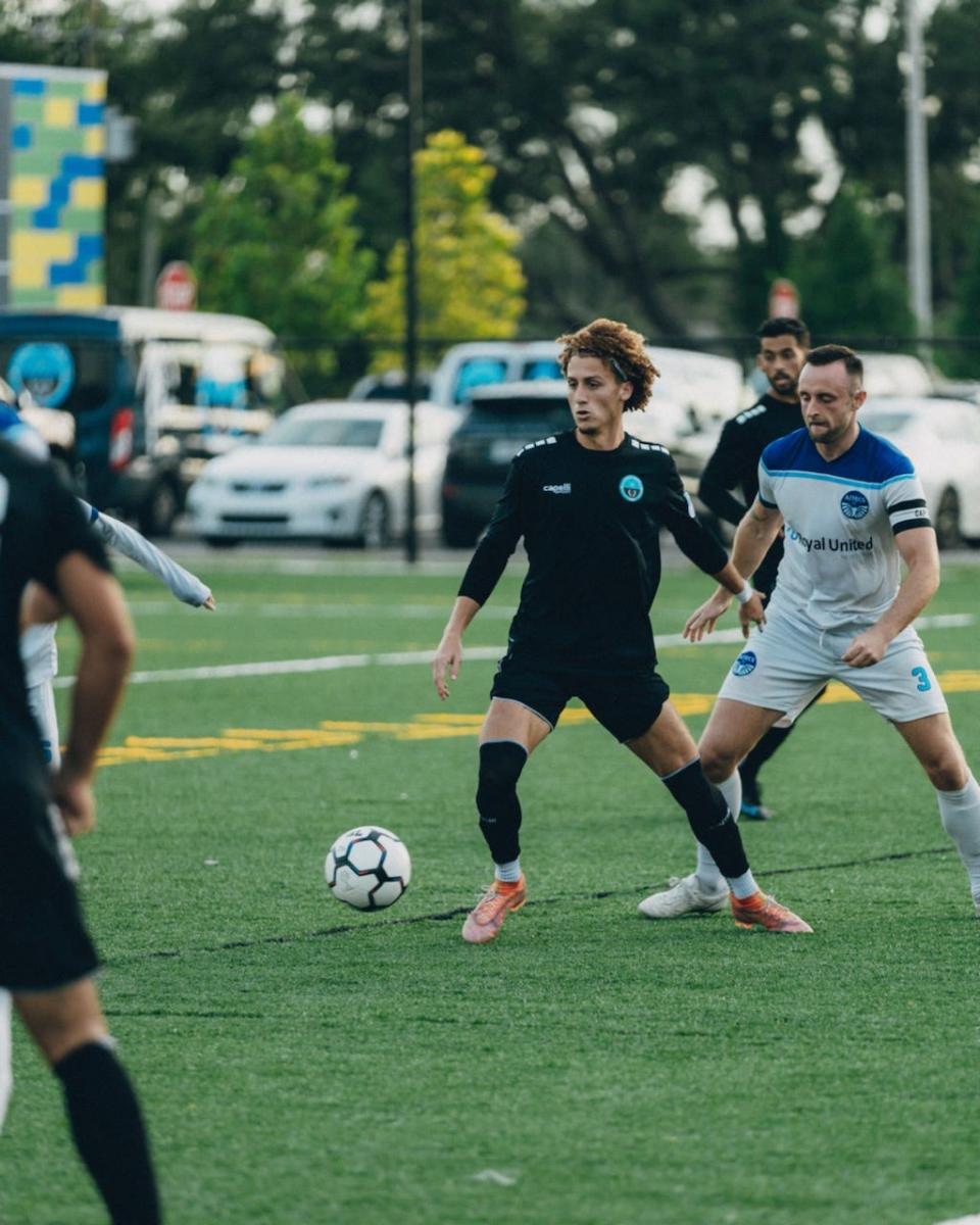 Lakeland United's Josh Ramos dribbles the ball during a UPSL playoff contest versus the St. Petersburg Aztecs on Saturday, July 2, in St. Petersburg. The United won the game 4-3 and advanced to the Round of 16.