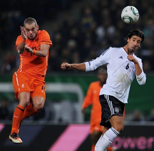 Dutch midfielder Wesley Sneijder (L) and Germany's midfielder Sami Khedira vie for the ball during the friendly match of Germany vs the Netherlands in preparation of the Euro 2012 in Hamburg, northern Germany. Germany won 3-0