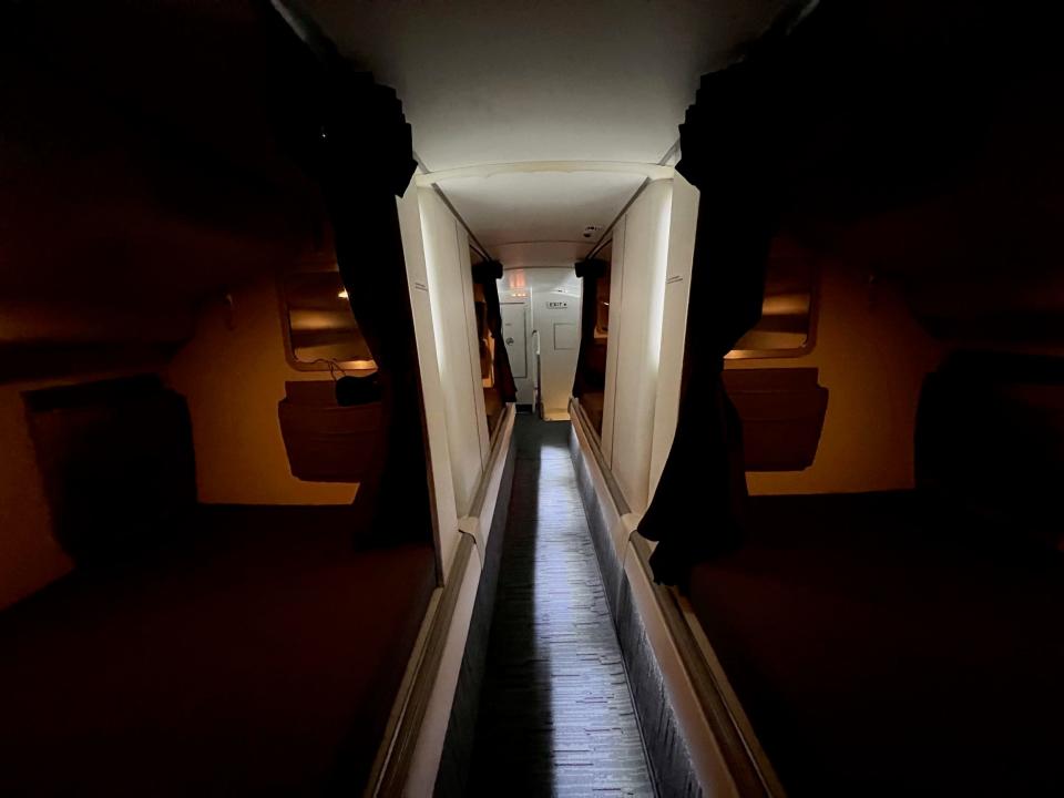 Qatar's Boeing 777-200LR flight attendant crew rest area.