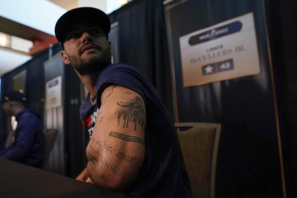 Houston Astros starting pitcher Lance McCullers Jr. displays his tattoos ahead of Game 1 of the baseball World Series between the Houston Astros and the Philadelphia Phillies on Thursday, Oct. 27, 2022, in Houston. Game 1 of the series starts Friday. (AP Photo/David J. Phillip)