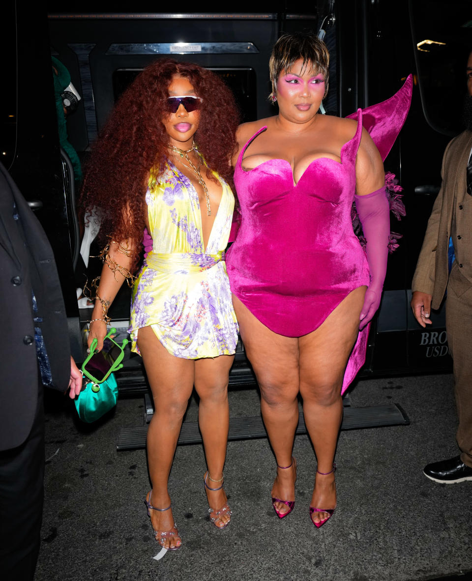 SZA and Lizzo in New York City at Met Gala afterparty wearing strappy sandals