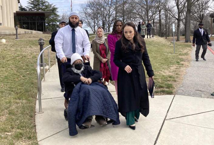 Adnan Syed leave the Appellate Court of Maryland with his family and lawyer,  Erica Suter, after arguments on Feb. 2, 2023, in an appeal from Hae Min Lee's bother, Young Lee.  / Credit: Barbara Haddock Taylor/The Baltimore Sun/Tribune News Service via Getty Images