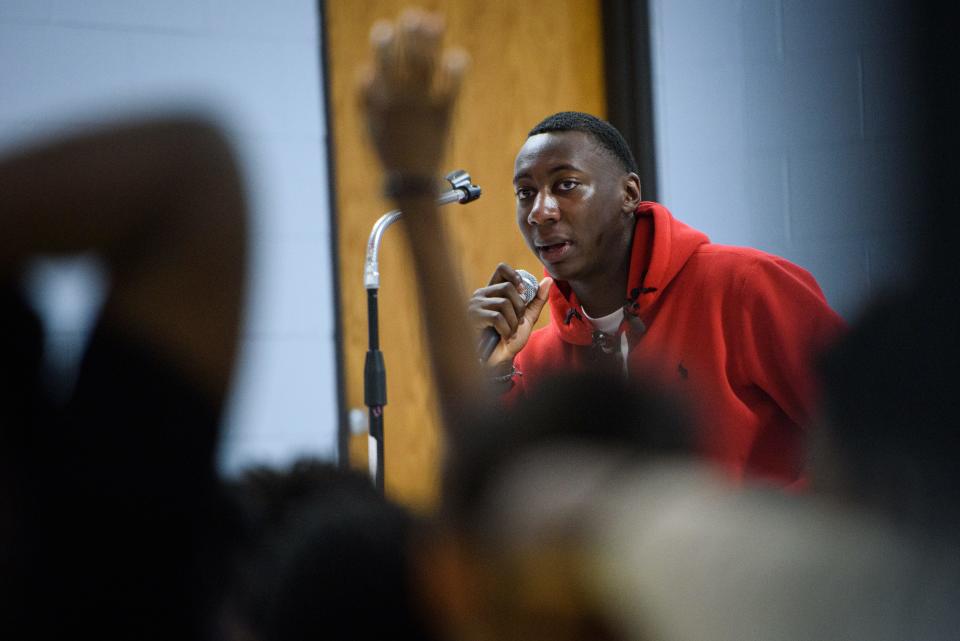 Kansas City Chiefs football player and Fayetteville native Joshua Williams takes questions from students at Loyd Auman Elementary School on Thursday, March 2, 2023. Williams read a Dr. Suess book, shared his Super Bowl experiences and answered student questions during the visit.  