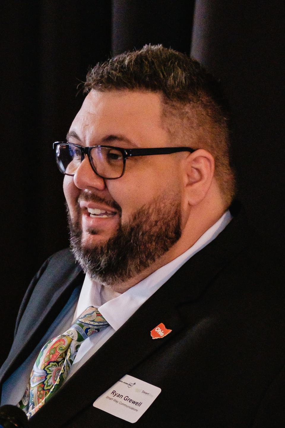 Ryan Grewell, general manager of Smart Way Communications, talks about about the Digital Access Ohio Initiative Monday at Breitenbach Wine Cellars in Dover Township.