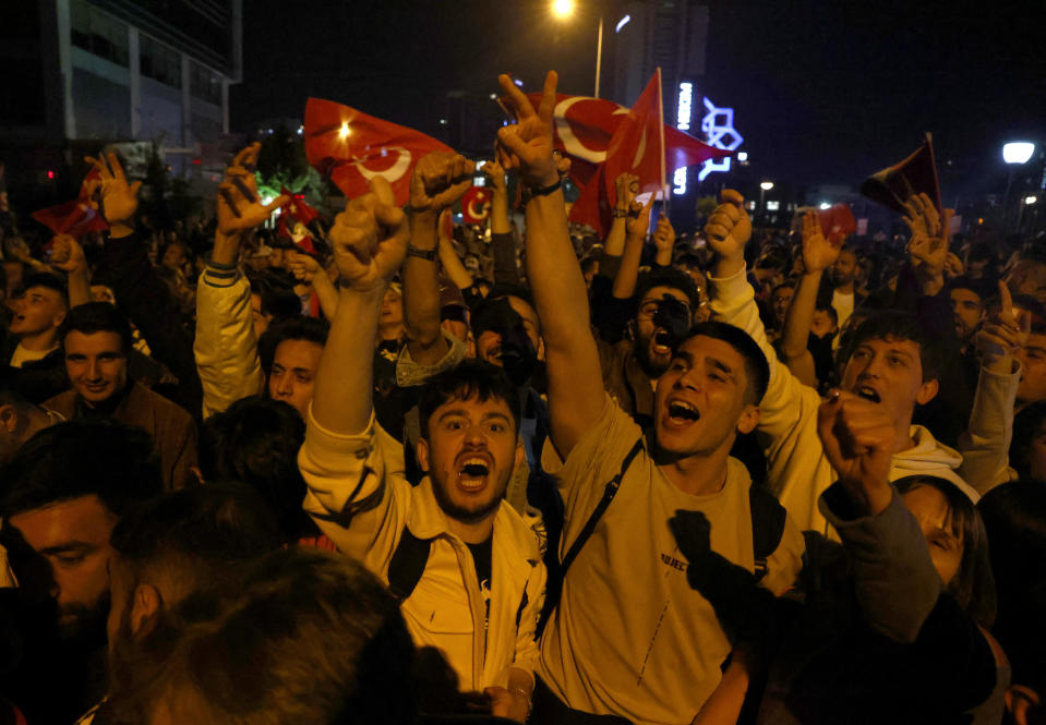 Supporters of Kemal Kilicdaroglu’s, presidential candidate of Turkey's main opposition alliance,  react after early exit polls at the Republican People's Party (CHP) headquarters in Ankara, Turkey May 14, 2023. REUTERS/Cagla Gurdogan