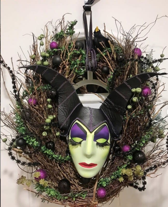 <p>@noirfolklor</p><p>Is that Angelina Jolie?! This <em>Maleficent</em>-themed wreath from <a href="https://www.instagram.com/noirfolklor/" rel="nofollow noopener" target="_blank" data-ylk="slk:@noirfolklor;elm:context_link;itc:0;sec:content-canvas" class="link ">@noirfolklor</a> is a masterpiece!</p>