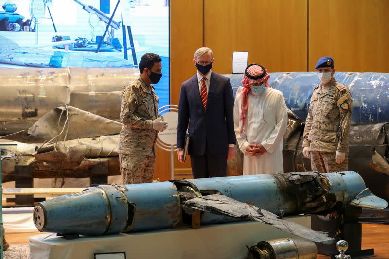 Saudi Arabia's Minister of State for Foreign Affairs Adel al-Jubeir and U.S. Special Representative for Iran Brian Hook, check the display of the debris of ballistic missiles and weapons, in Riyadh