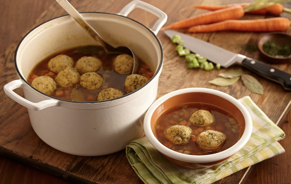 <p>There’s no better first course on a Jewish holiday table than a big bowl of matzo ball soup. Matzo balls are made by combining matzo meal with eggs, baking powder and some schmaltz. Roll them into balls and boil in chicken stock for 45 minutes or so. </p> <p><a href="https://www.thedailymeal.com/flavorful-matzo-ball-soup-recipe?referrer=yahoo&category=beauty_food&include_utm=1&utm_medium=referral&utm_source=yahoo&utm_campaign=feed" rel="nofollow noopener" target="_blank" data-ylk="slk:For the Matzo Ball Soup recipe, click here.;elm:context_link;itc:0;sec:content-canvas" class="link ">For the Matzo Ball Soup recipe, click here.</a></p>