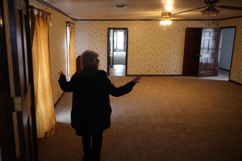 The Rev. Dana Orwig walks inside the house that will be home to the nonprofit Magdalene House OKC, a women's residential program founded by the Episcopal Diocese of Oklahoma.