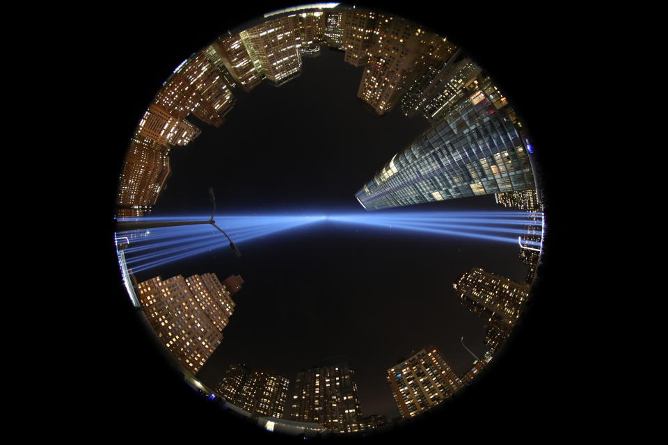 <p>The Tribute in Light art installation consists of 88 searchlights that create two vertical columns of light on Sept. 11, 2017. (Gordon Donovan/Yahoo News) </p>