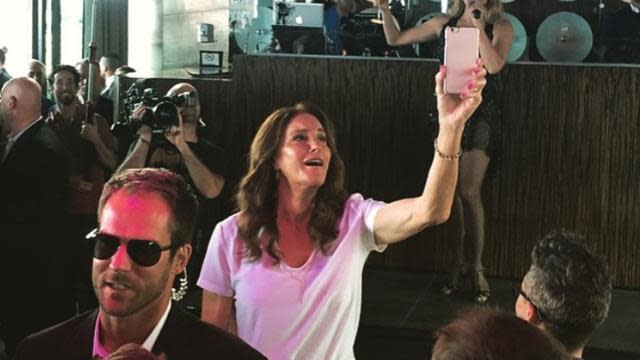 <strong>Caitlyn Jenner</strong> has earned herself a party, dammit. And on Sunday, party she did, when she stepped out during New York City’s LGBT Pride celebration. Caitlyn, 65, stopped by an event at PHD Rooftop Lounge at the Dream Downtown Hotel in Chelsea. She made quite the entrance, arriving to the applause of fellow partygoers, with some screaming, “We love you, Caitlyn!” <strong> WATCH: New ‘I Am Cait’ promo shows Caitlyn getting glam, motorcycling</strong> Caitlyn, who wore a flowing white dress, apparently had her E! cameras in tow, filming the festivities for her upcoming eight episode docu-series, <em>I Am Cait</em>, which premieres on July 26. Caitlyn Jenner is filming her reality show at New York Pride. pic.twitter.com/4pCqksjIjU— Ramin Setoodeh (@RaminSetoodeh) June 28, 2015 But honestly, it looks like it was more play than work. OMG @Caitlyn_Jenner is at my party! Happy pride!!! ������ #NYCPride2015 pic.twitter.com/KWsOrDATIT— De$ha-Tron (@Deshasuxx) June 28, 2015 Caitlyn was with a group of girlfriends who came to see trans actress and performer Candis Cayne (Dirty Sexy Money, Elementary) do a special show. At one point, Cayne dedicated the song "I Am a Woman" to Jenner, and later, Caitlyn returned the favor by making it rain cash all over Cayne while she was dancing. <strong> EXCLUSIVE: Get details on the motivational speech Caitlyn gave trans youths</strong> She did have a security team with her, but according to one fellow celebrant, everyone was respectful and let her enjoy the show. "You could tell she was touched by the love and pride of the performance and attendees," Dan Steele Green told ET. "She showed grace and beauty and represented what this weekend is all about. Caitlyn was definitely feeling it -- yet kept to herself and just genuinely enjoyed the afternoon." Steele added, "You could tell she was comfortable in her own skin and appreciating the spirit of the event." And if that doesn't scream Pride, we don't know what does. Original video footage courtesy Steele Luxury Travel (steeletravel.com).