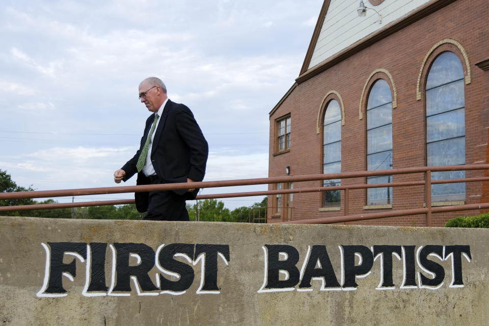 Pastor Bart Barber walks to his church office at the First Baptist Church of Farmersville, Texas, before worship on Sunday, Sept. 25, 2022. Barber said he ran for Southern Baptist Convention president because he prayed and concluded God was calling him to do it, not because of the sex abuse crisis. (AP Photo/Audrey Jackson)