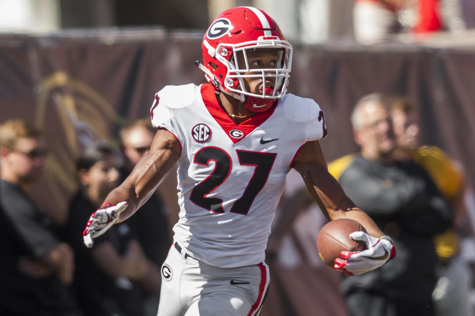 COLUMBIA, MO - SEPTEMBER 22:  Georgia Bulldogs defensive back Eric Stokes (27) looks back after scoring a touchdown from a blocked punt during the game between the Georgia Bulldogs and the Missouri Tigers on Saturday September 22, 2018 at Faurot Field in Columbia, MO.  (Photo by Nick Tre. Smith/Icon Sportswire via Getty Images)