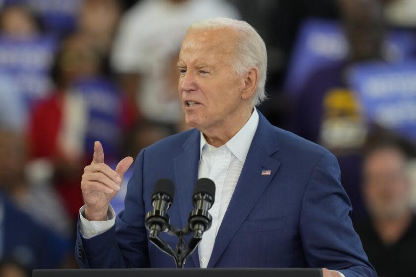 President Joe Biden gestures during his remarks at Renaissance High School during a Friday, July 12, 2024, campaign event in Detroit. (AP Photo/Carlos Osorio)