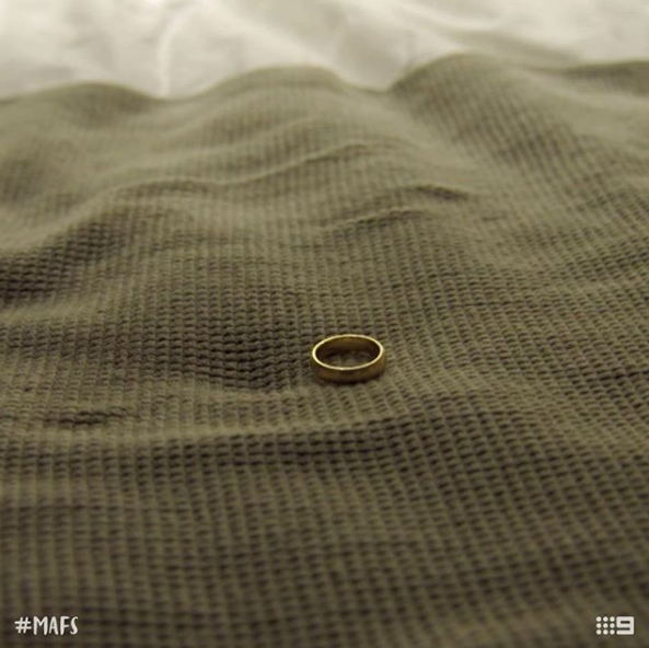 MAFS 2020 star Luke Eglin's gold wedding band on a bed