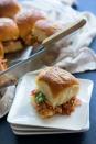 <p>We're slidin' away from crust.</p><p>Get the recipe from <a href="/cooking/recipe-ideas/recipes/a52148/bbq-chicken-pizza-sliders-recipe/" data-ylk="slk:Delish;elm:context_link;itc:0;sec:content-canvas" class="link ">Delish</a>.</p>