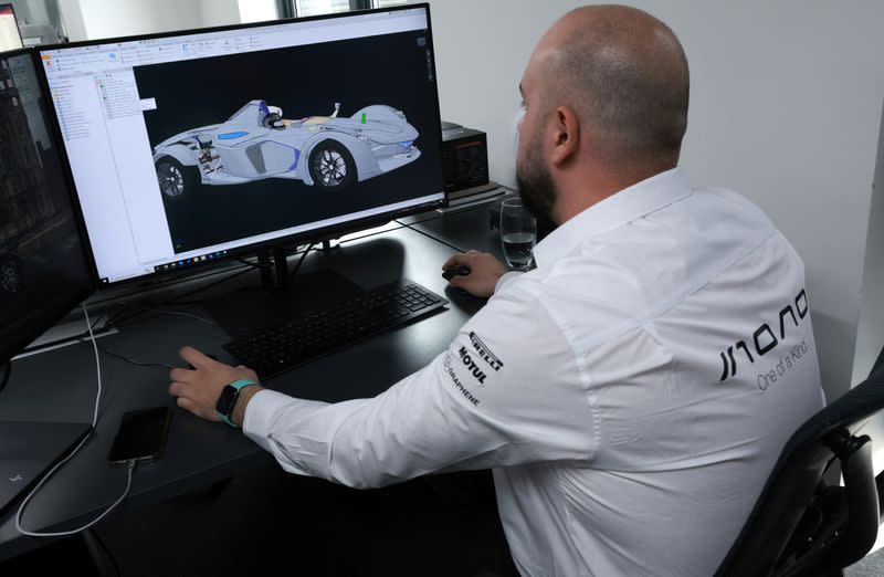 An engineer works on a computer generated design of a BAC Mono car at the company's factory in Liverpool