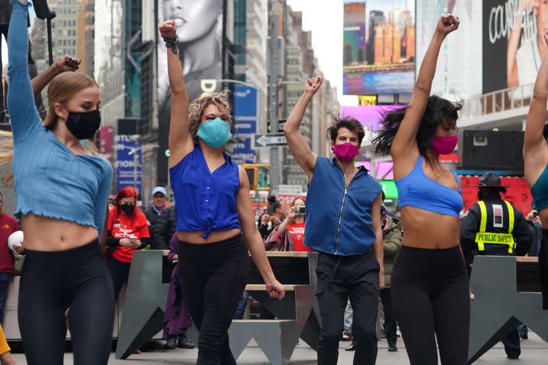 Performers take part in a pop up Broadway performance in anticipation of Broadway reopening in New York City