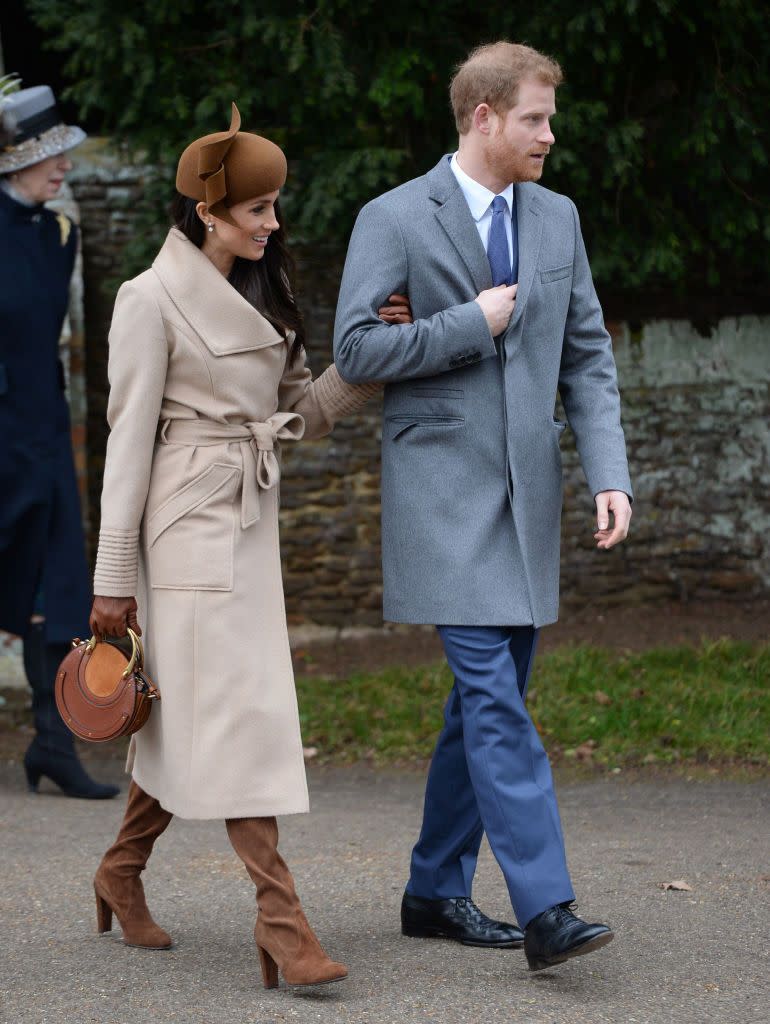 Walking arm in arm to Christmas Day church services in Sandringham