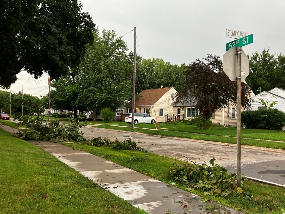 Tree debris is seen along 52nd Street in Des Moines near the Franklin Avenue Library after severe storms blew through the metro on Monday, July 15, 2024.