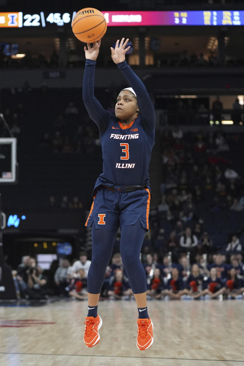 Illinois guard Makira Cook (3) shoots during the first half of an NCAA college basketball game against Maryland at the Big Ten women's tournament Thursday, March 7, 2024, in Minneapolis. (AP Photo/Abbie Parr)