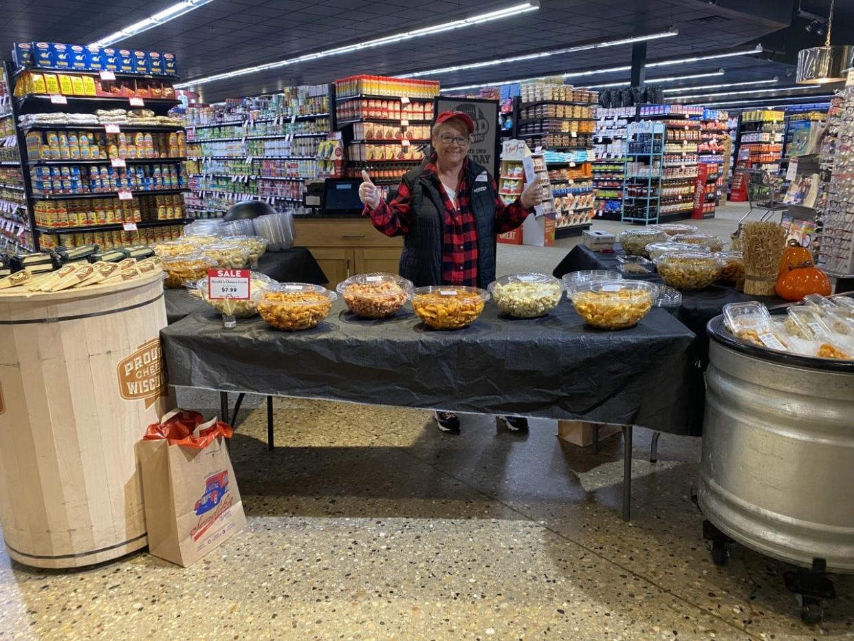 At Sendik's cheese curd events, which are held every few weeks, customers walk up to tables full of curds and a store associate puts together a customizable cheese curd sampler box with the kinds and amounts of each that they want in it.