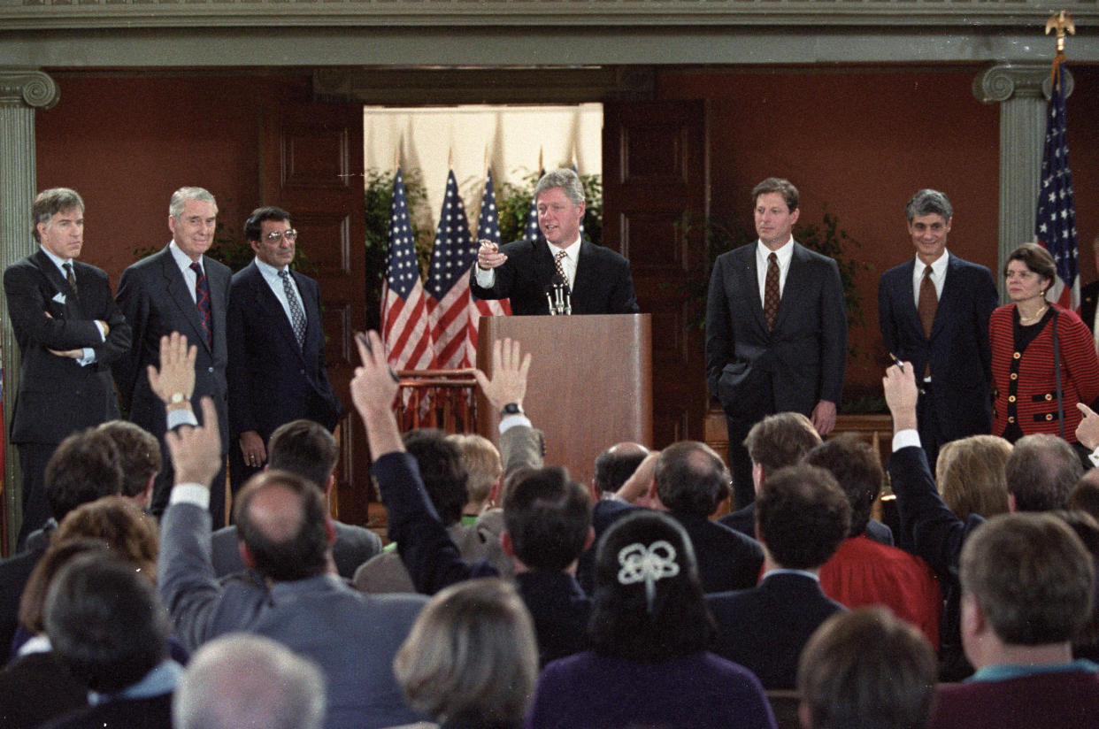 President-Elect Bill Clinton (Center) takes questions from the media after announcing the economic team for his administration, December 10, 1992 in Little Rock, Arkansas. The appointees are (L-R) Alice Riwlin, Deputy Director of the Office of Management and Budget, Robert Rubin, Chairman of National Economic Council, Vice President-Elect Al Gore, President-Elect Clinton, Leon Patta, Office of Management and Budget, Lloyd Bentsen, Secretary of the Treasury, and Roger Altman, Department of the Treasury.       REUTERS/Gary Hershorn (UNITED STATES POLITICS) BEST QUALITY AVAILABLE