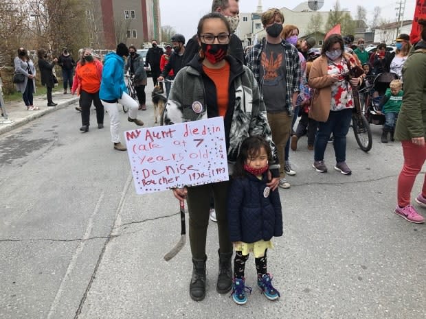 Shene Catholique-Valpy was among the marchers Friday. People took to the streets in Yellowknife as part of the Dene Nation memorial gathering.