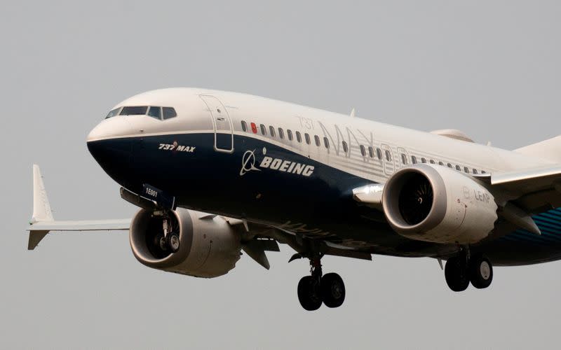 FILE PHOTO: A Boeing 737 MAX aircraft lands during an evaluation flight in Seattle