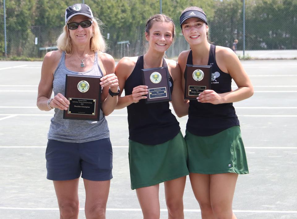 Stowe coach Amy Picotte (left) poses with doubles state champions Gabby Doehla (center) and Kate Tilgner after their 6-1, 6-1 win over CVU's Addie Maurer and Ariel Toohey.