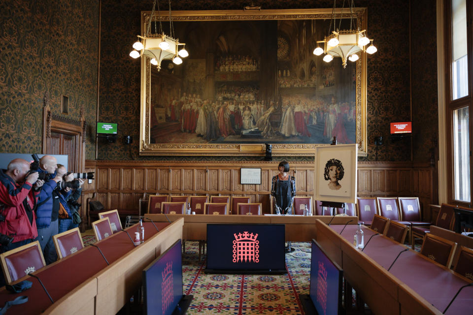 LONDON, ENGLAND - OCTOBER 11: Ai-Da Robot, the world's first ultra-realistic humanoid robot artist, appears at a photo call in a committee room in the House of Lords on October 11, 2022 in London, England. AI-Da Robot will deliver her maiden speech to members of the Lords Communications and Digital Committee in the House of Lords. She explores the theme of whether creativity in the UK is under attack from technology and also the role of machine learning, machine creativity and Artificial Intelligence within the UK's creative industries. (Photo by Rob Pinney/Getty Images)