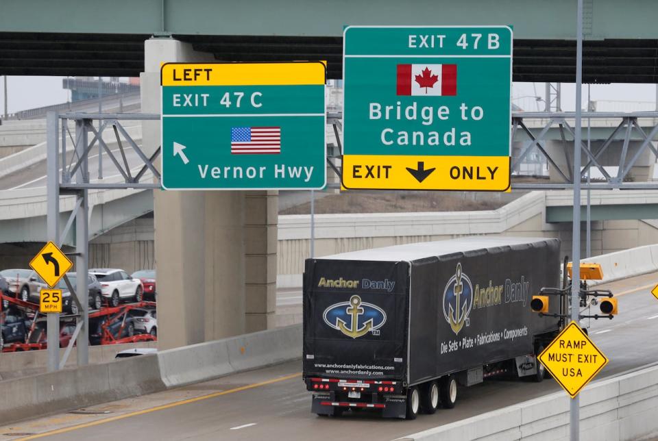 A commercial truck heads for the Ambassador Bridge , during the coronavirus disease (COVID-19) outbreak, which connects with Windsor, Ontario, in Detroit, Michigan, U.S., March 18, 2020. 