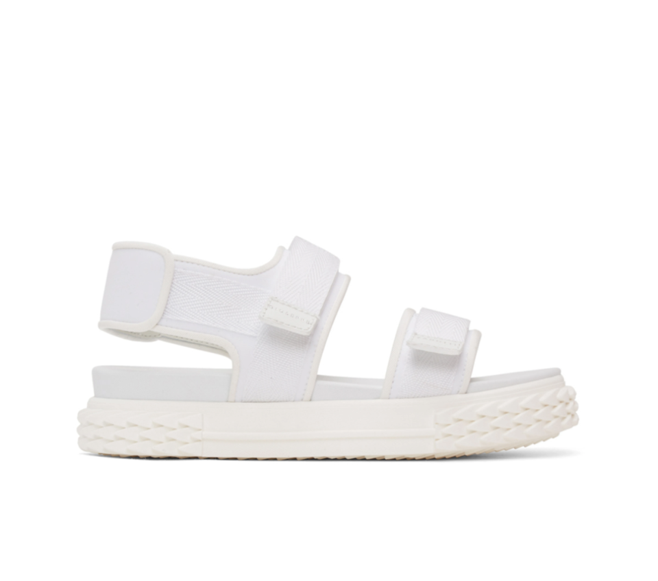 Giuseppe Zanotti White Carlito Flat Sandals. Image via SSENSE.