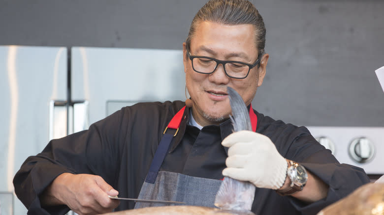 Chef Morimoto cutting whole tuna