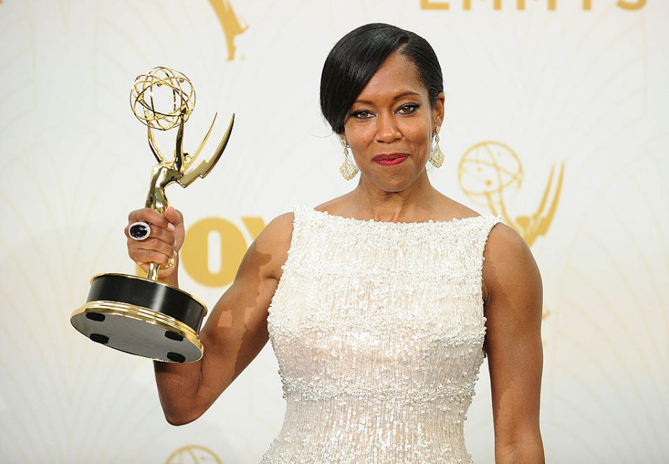 Regina King holding her Emmy