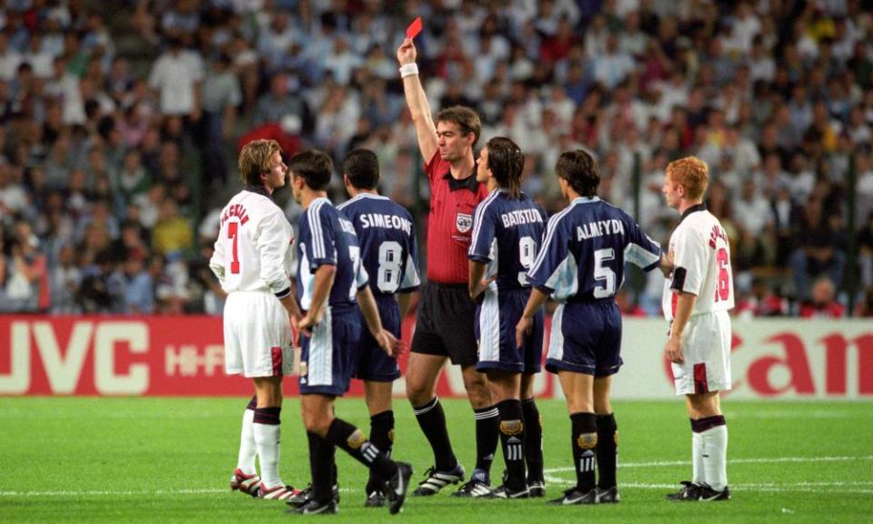 Beckham (far left) given the red card after a foul on Argentina’s Diego Simeone during their 1998 World Cup second round match.