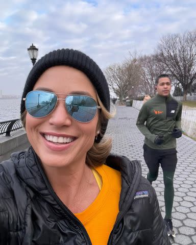 <p>Amy Robach/Instagram</p> Amy Robach and T.J. Holmes go for a run