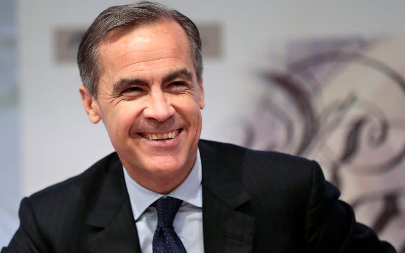 Bank of England governor Mark Carney smiles during a news conference at the Bank of England in London, Britain -  Suzanne Plunkett/ Suzanne Plunkett