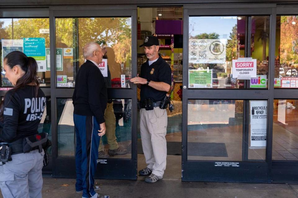 Federal officials conduct an enforcement action at Viva Supermarket on Norwood Avenue in North Sacramento in October. The store is owned by former Sacramento City Councilman Sean Loloee.