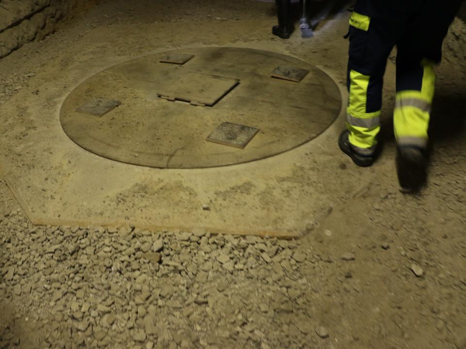 A picture shows the size of the hole in which the spent nuclear fuel is deposited.