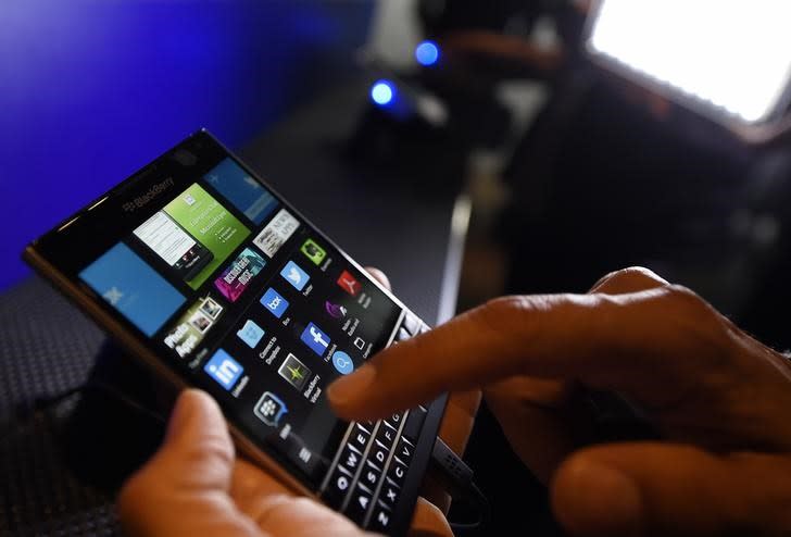 A BlackBerry Passport smartphone is shown at its official launching event in Toronto, September 24, 2014. REUTERS/Aaron Harris/Files