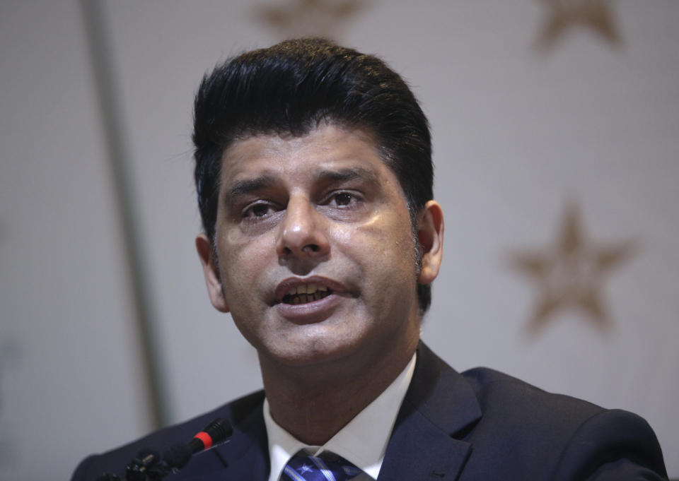 Chief selector of the Pakistan cricket squad Mohammad Wasim speaks during a press conference to announce the squad for upcoming Twenty20 World Cup, in Lahore, Pakistan, Monday, Sept. 6, 2021. Pakistan has recalled power-hitters Asif Ali and Khushdil Shah for next month's cricket Twenty20 World Cup. The selectors named a 15-member squad on Monday that will also play five-match home series against New Zealand later this month and a two-match series against England before flying out to the United Arab Emirates for the T20 World Cup. (AP Photo/K.M. Chaudary)