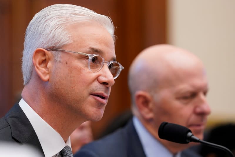 FILE PHOTO: Charles W. Scharf, chairman & CEO of the Bank of New York Mellon, testifies before a House Financial Services Committee hearing on Capitol Hill in Washington