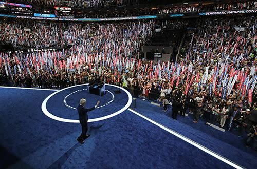 The convention cheers as Bill Clinton takes to the stage. Photo: Getty.